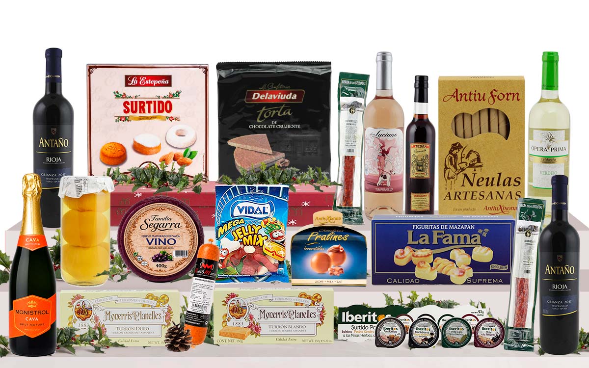 Lot nadalenc amb cava, vi blanc, vi negre, neules artesanes, torrons variats, galetes assortides, bombons, llaminadures, embotit i crema per untar, presentat com a regal de Nadal.