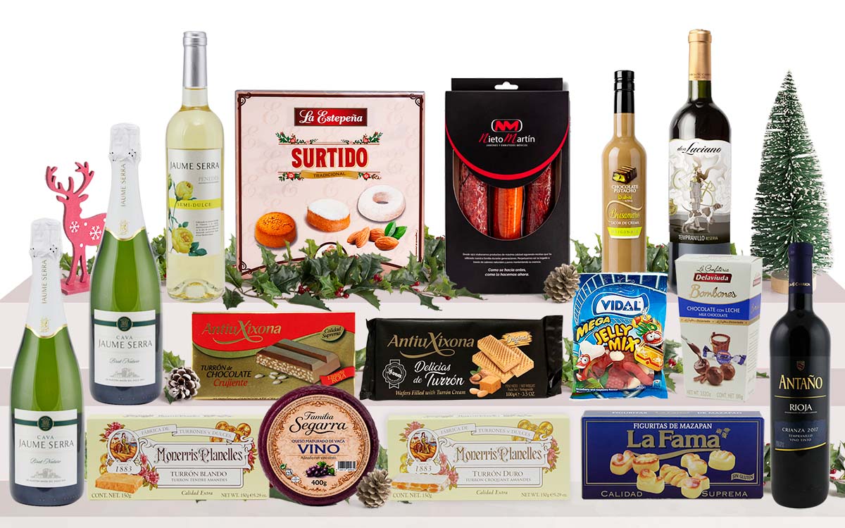 Lot nadalenc amb cava, vi blanc, vi negre, neules artesanes, torrons variats, galetes assortides, bombons, llaminadures, embotit i crema per untar, presentat com a regal de Nadal.