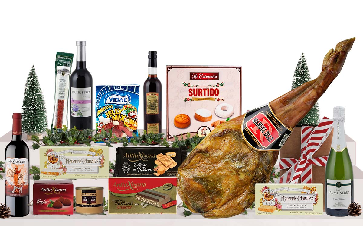 Lot de Nadal amb espatlla curada, cava, vins, vermut, embotits ibèrics, torrons, trufes, dolços nadalencs i llaminadures, presentat en una caixa de cartró per a espatlla.