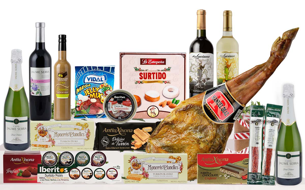 Lot nadalenc premium amb espatlla curada, cava, vins, vermut, patés, torrons, neules, embotits, llaminadures i dolços tradicionals, presentat com a regal de Nadal.