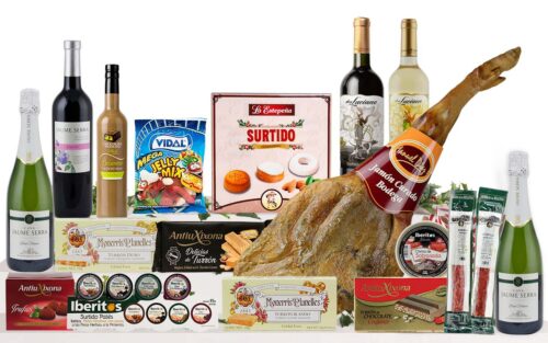 Lot nadalenc premium amb jamon curado, cava, vins, vermut, patés, torrons, neules, embotits, llaminadures i dolços tradicionals, presentat com a regal de Nadal.