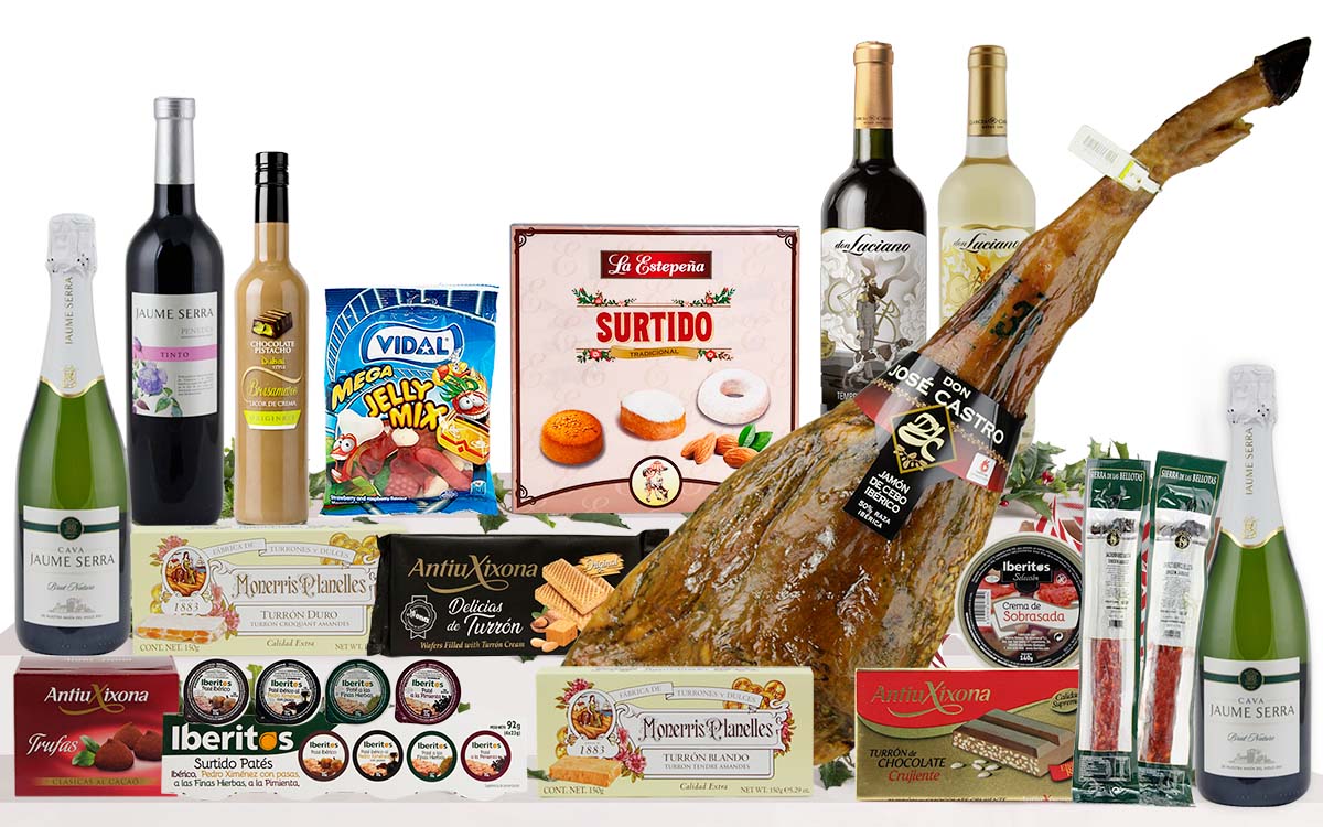 Lot nadalenc premium amb pernil curat, cava, vins, vermut, patés, torrons, neules, embotits, llaminadures i dolços tradicionals, presentat com a regal de Nadal.