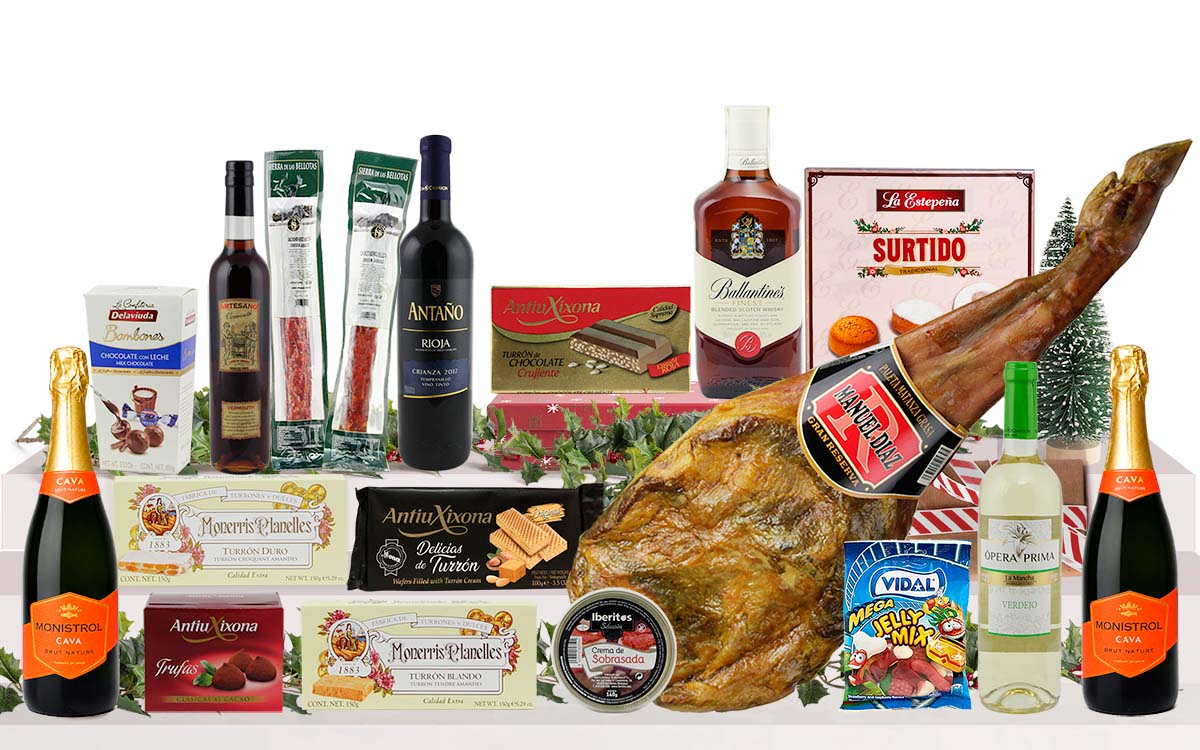 Lot nadalenc premium amb espatlla curada, cava, vi, whisky, vermut, embotits ibèrics, torrons, bombons, dolços tradicionals i llaminadures, presentat en una caixa de cartró decorada amb nansa.