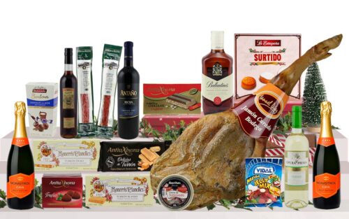 Lot nadalenc premium amb pernil curat, cava, vi, whisky, vermut, embotits ibèrics, torrons, bombons, dolços tradicionals i llaminadures, presentat en una caixa de cartró decorada amb nansa.