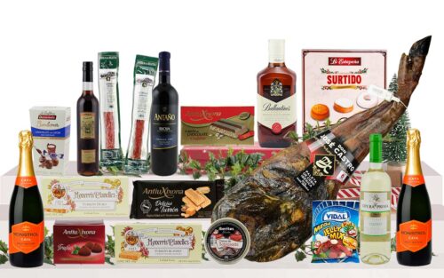 Lot nadalenc premium amb espatlla ibèrica de esquer, cava, vi, whisky, vermut, embotits ibèrics, torrons, bombons, dolços tradicionals i llaminadures, presentat en una caixa de cartró decorada amb nansa.