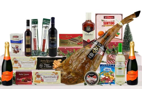 Lot nadalenc premium amb pernil ibèric de esquer, cava, vi, whisky, vermut, embotits ibèrics, torrons, bombons, dolços tradicionals i llaminadures, presentat en una caixa de cartró decorada amb nansa.