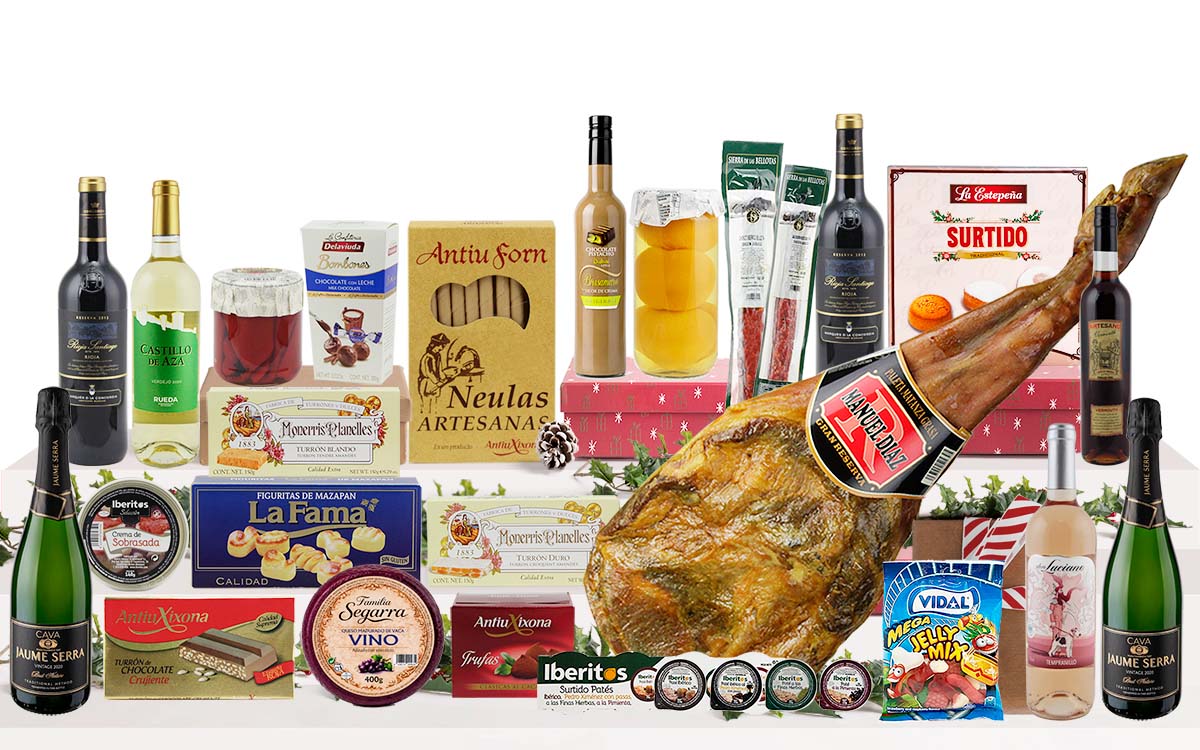 Lot nadalenc premium amb espatlla curada, cava, vins, licor de xocolata i festuc, vermut, formatge, embotits ibèrics, patés, pebrots del piquillo, préssecs en almívar, torrons, neules, bombons, massapà, dolços tradicionals i llaminadures, presentat en una caixa de cartró decorada amb nansa.