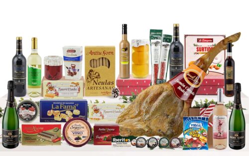 Lot gurmet de Nadal amb pernil de Cantimpalos, caves, vins, licors, embotits ibèrics, formatge, conserves, torrons, dolços tradicionals, bombons, neules, llaminadures i caixa decorativa amb nansa.