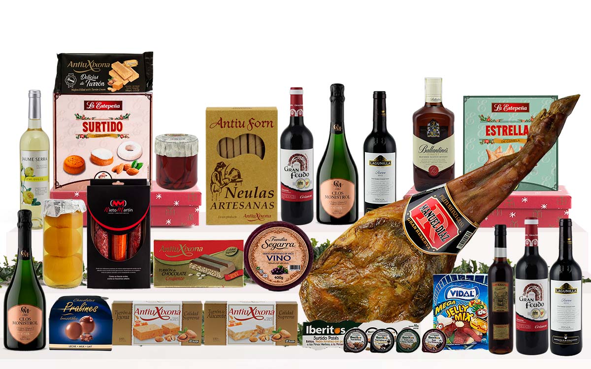 Lot gurmet de Nadal amb espatlla de matança de Cantimpalos, caves, vins, whisky, vermut, embotits, formatge, conserves, torrons, dolços tradicionals i caixa decorada amb nansa.