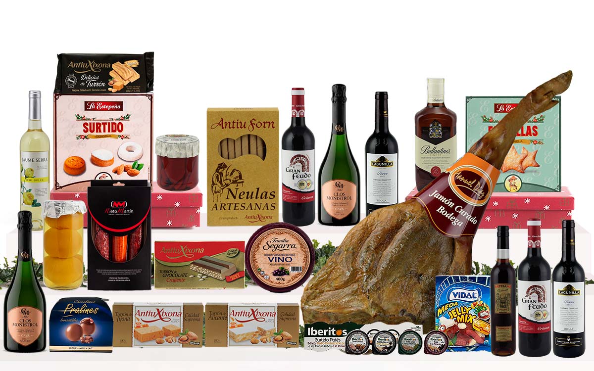 Lot gurmet de Nadal amb pernil bodega gras de Cantimpalos, caves, vins, whisky, vermut, embotits ibèrics, formatge, conserves, torrons, dolços tradicionals i caixa decorada amb nansa.