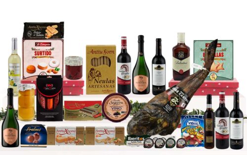 Lot gurmet de Nadal amb espatlla ibèrica d'engreix de Salamanca, caves, vins, whisky, vermut, embotits ibèrics, formatge, conserves, torrons, dolços tradicionals i caixa decorada amb nansa.