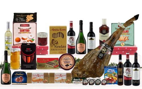 Lot gurmet de Nadal amb pernil ibèric d'engreix de Salamanca, caves, vins, whisky, vermut, embotits ibèrics, formatge, conserves, torrons, dolços tradicionals i caixa decorada amb nansa.
