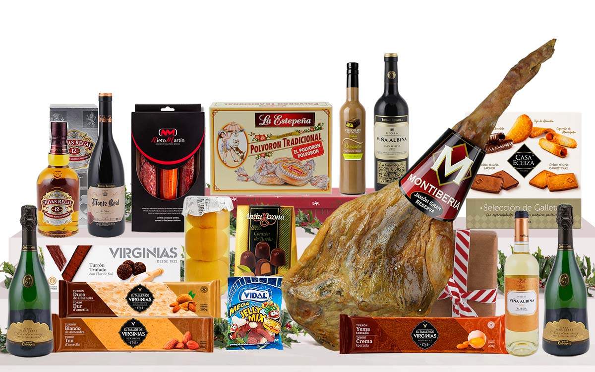 Lot gurmet de Nadal amb pernil bodega Gran Reserva de Cantimpalos, cava reserva, vins Gran Reserva, whisky, licor, embotits ibèrics, torrons artesans, dolços tradicionals i caixa decorada amb nansa.