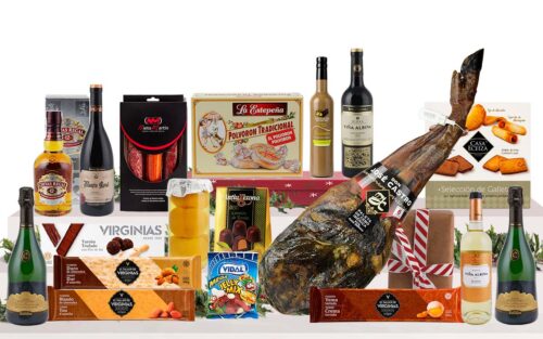 Lot gurmet de Nadal amb espatlla ibèrica d'engreix de Salamanca, cava reserva, vins Gran Reserva, whisky, licor, embotits ibèrics, torrons artesans, dolços tradicionals i caixa decorada amb nansa.