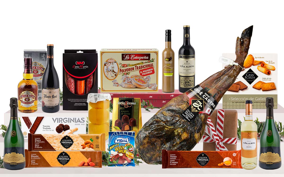 Lot gurmet de Nadal amb espatlla ibèrica d'engreix de Salamanca, cava reserva, vins Gran Reserva, whisky, licor, embotits ibèrics, torrons artesans, dolços tradicionals i caixa decorada amb nansa.