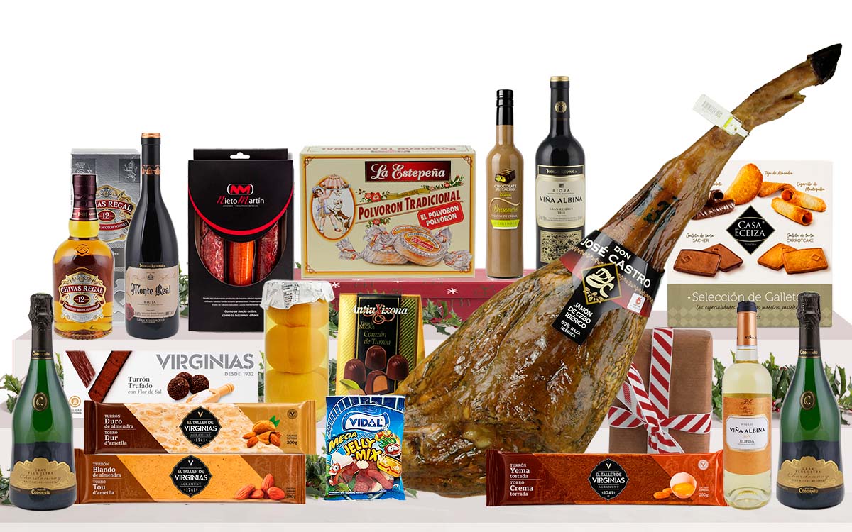 Lot gurmet de Nadal amb pernil ibèric d'engreix de Salamanca, cava Gran Plus Ultra Chardonnay, vins Gran Reserva, whisky, licor, embotits ibèrics, torrons artesans, dolços tradicionals i caixa decorada amb nansa.
