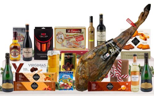 Lot gurmet de Nadal amb jamon bellota, cava Gran Plus Ultra Reserva, vins Gran Reserva, whisky, licor, embotits ibèrics, torrons artesans, dolços tradicionals i caixa decorada amb nansa.