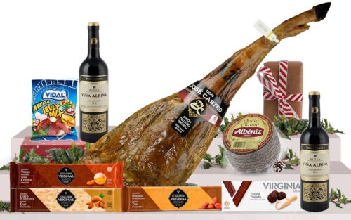 Lot gurmet de Nadal amb pernil ibèric d'engreix de Salamanca, vi Gran Reserva, assortiment d'ibèrics, formatge curat, torrons artesans i caixa decorada amb nansa.