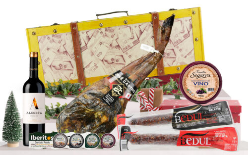 Lot gastronòmic amb paleta ibèrica de gla de Salamanca, vi negre Rioja Reserva, xoriço i salxitxó ibèrics de gla, assortiment de patés, formatge de vaca madurat al vi i maleta de fusta.