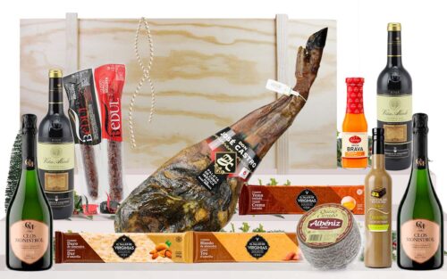 Lot gourmet amb paleta ibèrica de cebo de Salamanca, cava, vins, embotits ibèrics, formatge, torrons i licor, presentat en una caixa jamonera de fusta.