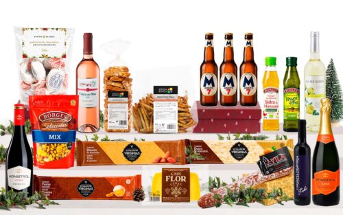 Lot gurmet de Nadal amb cava, vins catalans, garnatxa de l'Empordà, cerveses, oli d'oliva verge extra, formatge, fuet, fruits secs, torrons artesans i caixa decorada amb nansa.