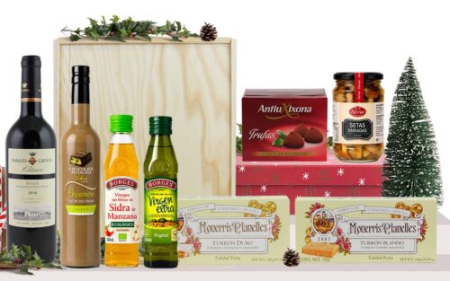 Lot gourmet amb vi negre Marqués de Griñón Clásico, licor de crema de xocolata i pistatxo, oli d’oliva verge extra, vinagre ecològic de sidra, bolets, torrons i tòfones, presentat en una caixa de fusta.