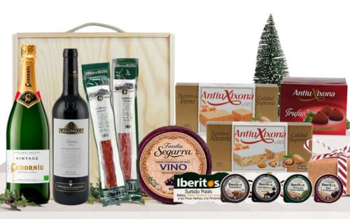 Lot gourmet amb cava Codorníu Vintage Brut Eco, vi negre Rioja Lagunilla Reserva, embotits ibèrics, formatge de vaca al vi, patés, torrons i tòfones, presentat en una caixa de fusta amb nansa. Descripció